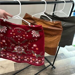 Bundle of three cute size small mini skirts!